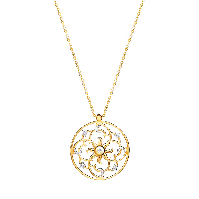 Yellow Gold, White Gold and Diamonds. The 14 karat gold pendant necklace is a representation of the galaxy with the bright sun in the centre. Diamond necklace.