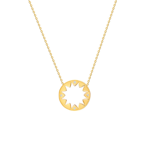 This 14 karat gold diamond pendant is inspired by mediterranean summer days and is the ultimate piece for sun-worshippers. The pendant features 4 handset sparkling diamonds pointing out the cardinal points. 