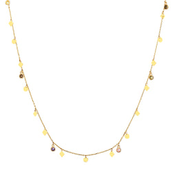 The Nomad Necklace in 14 karat gold is our longest handmade necklace (100cm) and can be worn in many ways. This gold chain with its dazzling charms and stones is the ultimate piece for a layering look. 