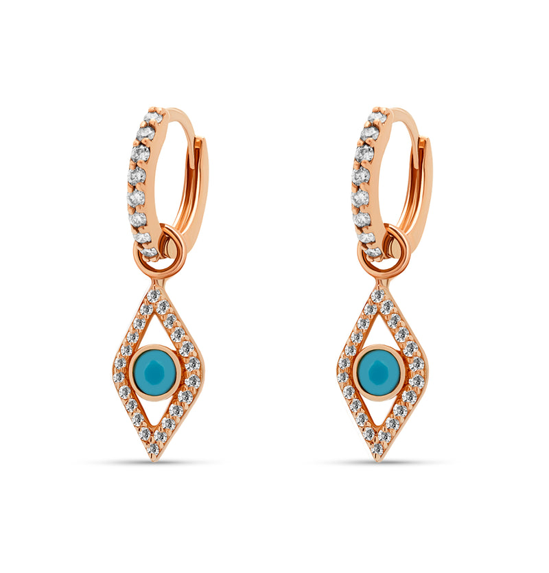 Two pairs of earrings in one! The 14 karat gold Evil Eye Turquoise Huggies feature handset diamonds and a turquoise gemstone.  rosegold diamond earrings