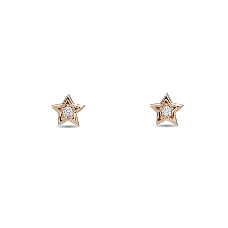 A little piece of the universe. Our 14 karat gold diamond star earring studs are petite and sparkly. rosegold star earring