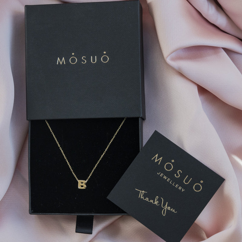 A 18 karat gold vermeil necklace with your initial letter "B". This diamond letter necklace is a special jewelry necklace that can be worn day and night. A genuine diamond stone in the corner of the letter makes this gold diamond necklace a luxury and ideal gift for yourself, your best friend or loved one.