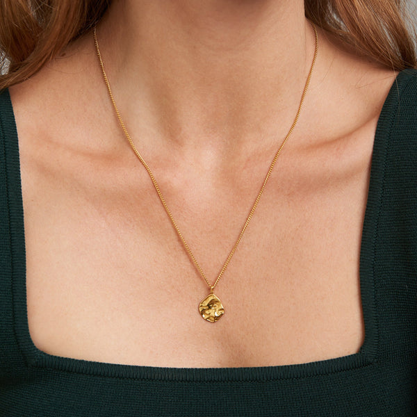 A magical and elegant gold pendant. This gold necklace features a mystical and shining gold pendant representing the strength and protection of greek goddess Hera. Team it with our Chunky Hoops or any gold necklaces for a layering look.
