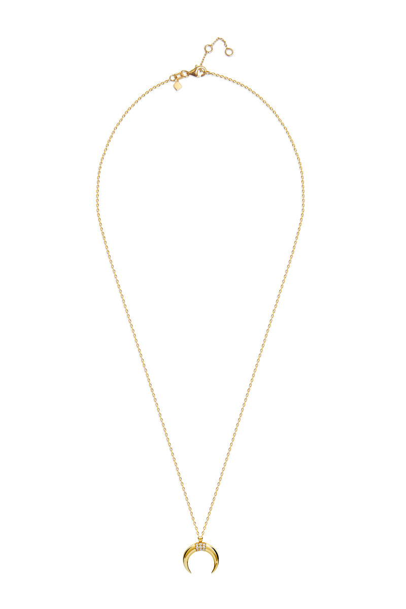 Feel like the queen of the universe with our our 14 karat gold Diamond Luna Pendant.  This gold pendant in shape of a moon features handset brilliant cut diamonds. A very comfortable and delicate diamond pendant that you can wear every day and that will match any look, day or event. 
