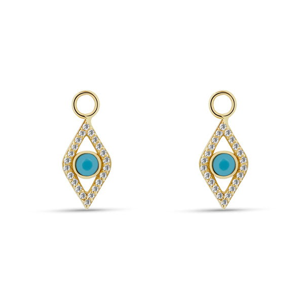 Our dazzling 14 karat gold charms for hoops feature the turquoise evil eye embodied in diamonds. Wear these charms on our Diamond Huggies or Essential Hoops for an extra dose of sparkle.