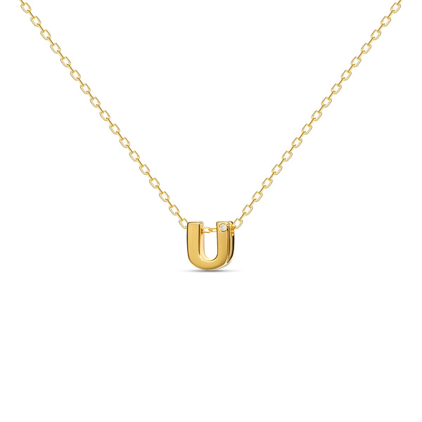 A 18 karat gold vermeil necklace with your initial letter "U". This diamond letter necklace is a special gold necklace that can be worn day and night. A genuine diamond stone in the corner of the letter makes this gold diamond necklace a luxury and ideal gift for yourself, your best friend or loved one. 