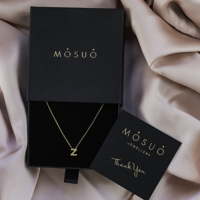 A 18 karat gold vermeil necklace with your initial letter "Z. This diamond letter necklace is a special gold necklace that can be worn day and night. A genuine diamond stone in the corner of the letter makes this gold diamond necklace a luxury and ideal gift for yourself, your best friend or loved one.