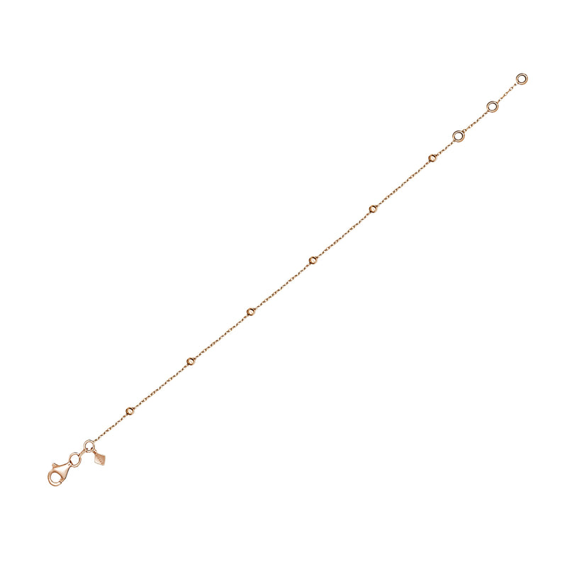 Rose Gold. The Basic Ball Bracelet for day to night wear is made of 14 karat gold. The bracelet features solid gold balls aligned on a delicate gold chain.